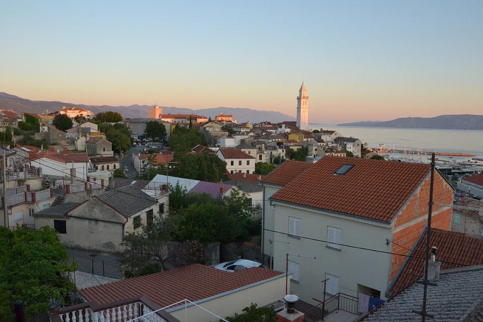 Novi Vinodolski’s rooftops and church tower in the evening light